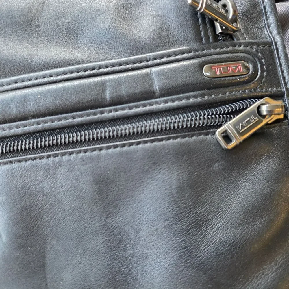 Tumi black leather briefcase